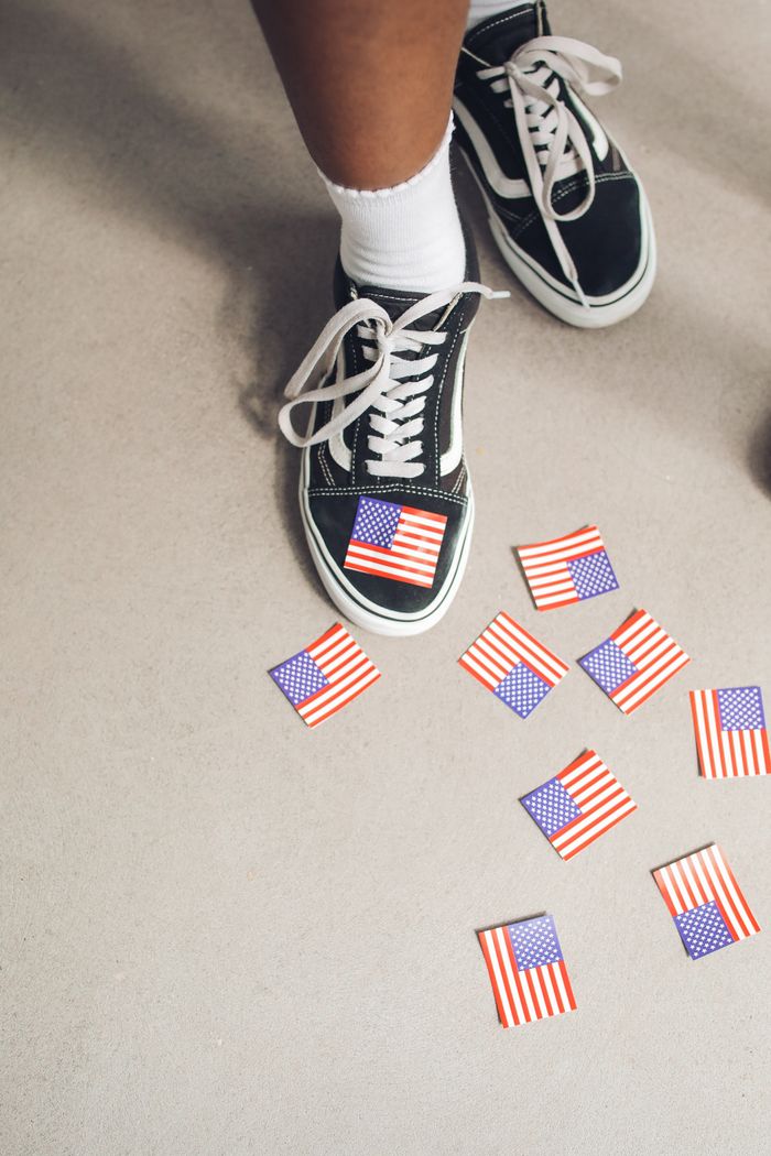 Close-up of a sneaker with American flags, symbolizing the USA Independence Day holiday.